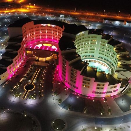 Millennium Hail Hotel Buitenkant foto Aerial view of the complex